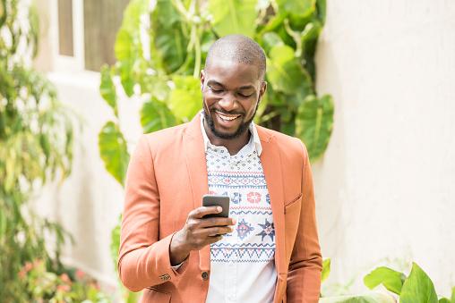 PowerFix client reviewing generator service update on mobile phone